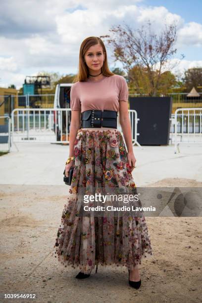 Marina Ruy Barbosa, wearing pink tshirt and long skirt, is seen before the Christian Dior show, on September 24, 2018 in Paris, France.