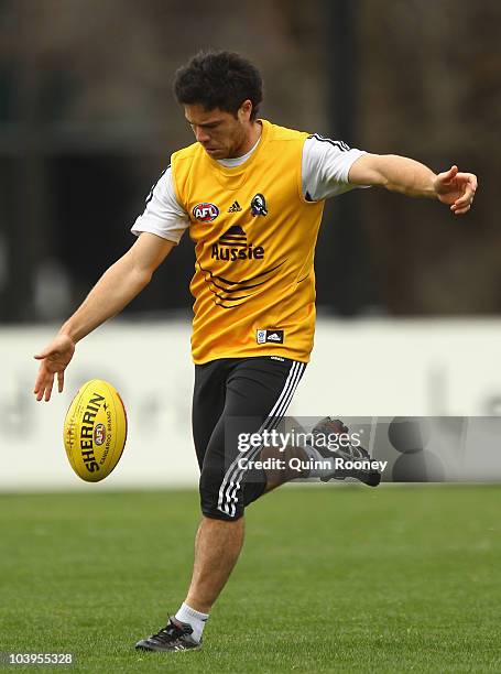 Paul Medhurst of the Magpies kicks during a Collingwood Magpies AFL training session at Gosch's Paddock on September 10, 2010 in Melbourne, Australia.