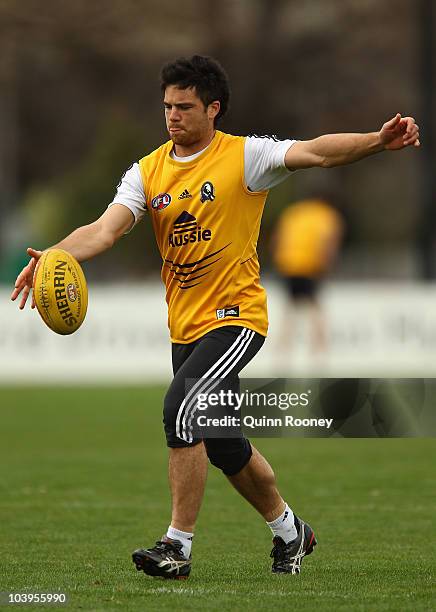 Paul Medhurst of the Magpies kicks during a Collingwood Magpies AFL training session at Gosch's Paddock on September 10, 2010 in Melbourne, Australia.