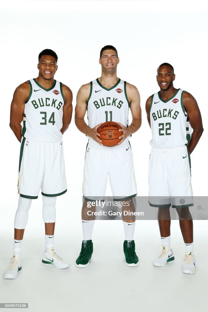 How tall is Lopez on the Bucks?