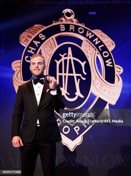 Tom Mitchell of the Hawks poses with the Brownlow Medal during the 2018 Brownlow Medal Count at Crown Palladium on September 24, 2018 in Melbourne,...