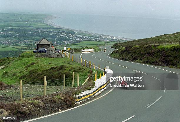 Joey Dunlop takes the bend at Guthries during the Isle of Man TT Races on the Isle of Man, Great Britain. \ Mandatory Credit: Ian Walton /Allsport