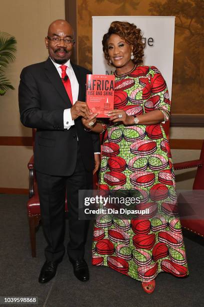 Businessman and author Jim Ovia andKay Ovia pose during a discussion of his book, Africa Rise And Shine: How A Nigerian Entrepreneur From Humble...