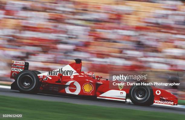 Michael Schumacher of Germany drives the Scuderia Ferrari Marlboro Ferrari F2002 Ferrari V10 to victory in the Formula One German Grand Prix on 28th...