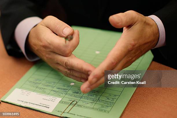 Berlin parliamentarian Rene Stadtkewitz gestures during he speaks to the media to announce the creation of a new right -of-center political party at...