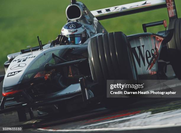 Kimi Raikkonen of Finland drives the West McLaren Mercedes McLaren MP4-17 Mercedes V10 during the Formula One Italian Grand Prix on 15 September 2002...