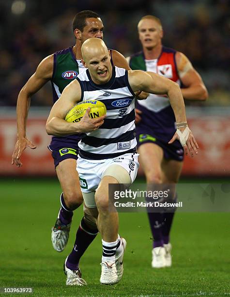 Gary Ablett of the Cats breaks away from his opponents during the AFL Second Semi Final match between the Geelong Cats and the Fremantle Dockers at...