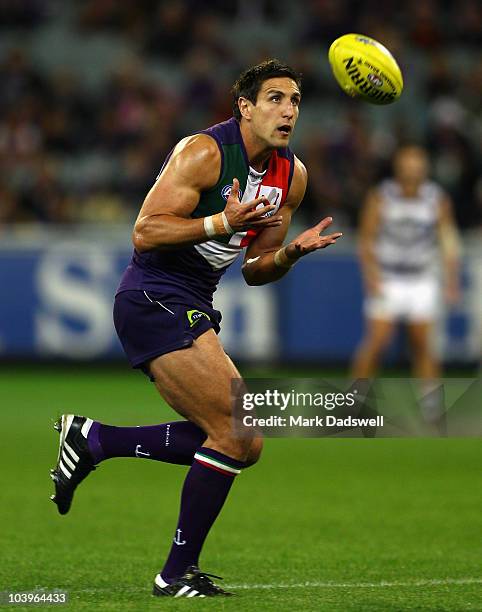 Matthew Pavlich of the Dockers gathers the ball during the AFL Second Semi Final match between the Geelong Cats and the Fremantle Dockers at...