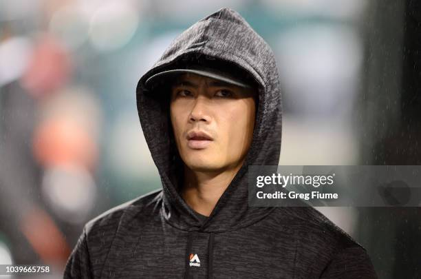 Wei-Yin Chen of the Miami Marlins watches the game in the seventh inning against the Washington Nationals at Nationals Park on September 24, 2018 in...