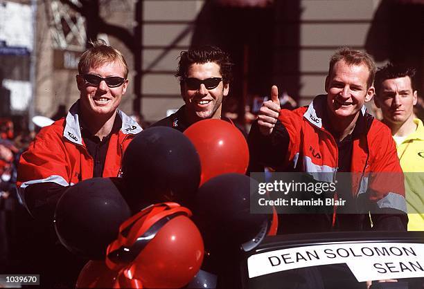 Paul Barnard, Dean Solomon and Sean Wellman of Essendon enjoy the atmosphere, during the AFL Grand Final Parade in the lead up to the Grand Final...