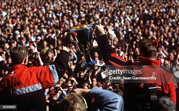 Captains, James Hird of Essendon and David Neitz of Melbourne hold the Premiership Cup, during the AFL Grand Final Parade in the lead up to the Grand...