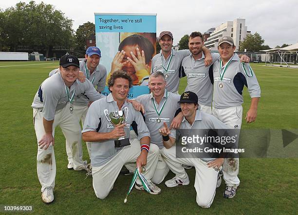 The team of Chris Pringle celebrate with the trophy after the England Champions League Final between Chris Pringle and The Fancy Dans during the Save...