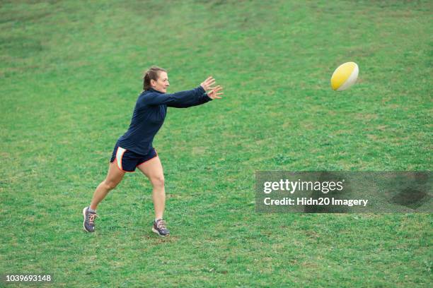 women's rugby training - passing stock pictures, royalty-free photos & images