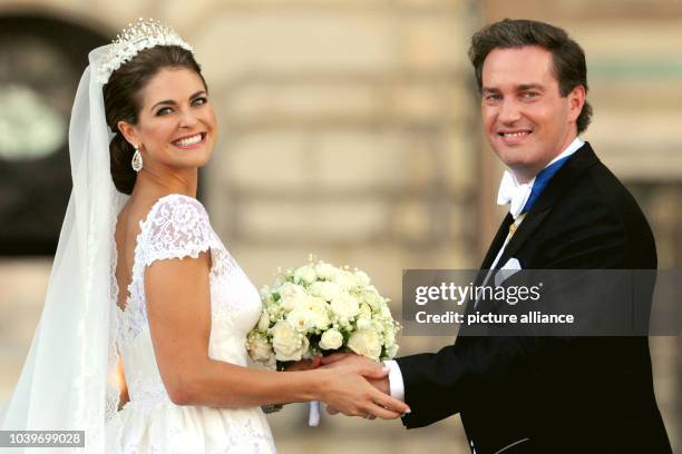 Swedish Princess Madeleine and her husband Chris O'Neill addresses the public at the Royal Palace after their wedding in Stockholm, Sweden, 08 June...