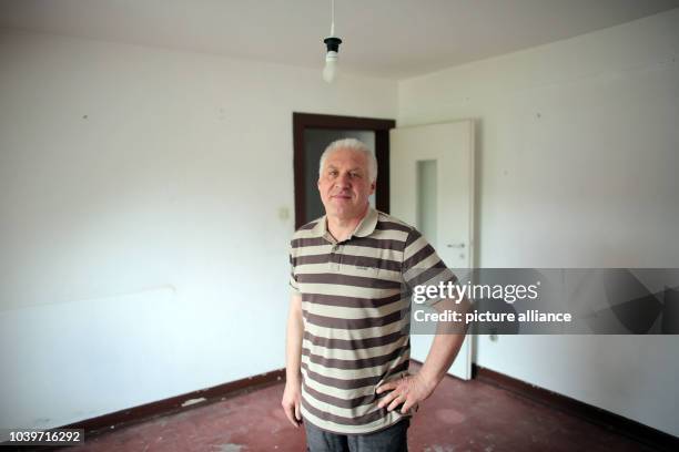 Tenant Kalle Gerigk stands in his apartment in Cologne, Germany, 15 April 2014. Friends and neighbors plan a blockade to stop the eviction of Kalle...