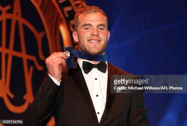 Brownlow Medallist Tom Mitchell of the Hawks poses for a photograph during the 2018 Brownlow Medal Count at Crown Palladium on September 24, 2018 in...