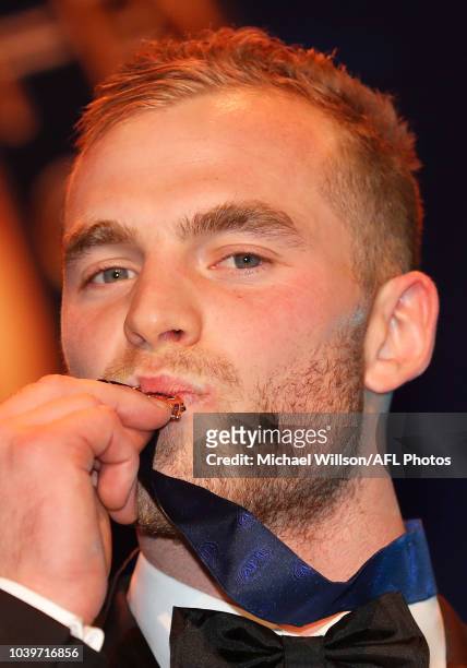 Brownlow Medallist Tom Mitchell of the Hawks poses for a photograph during the 2018 Brownlow Medal Count at Crown Palladium on September 24, 2018 in...