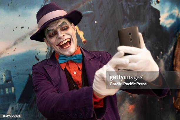 Cosplayer, Mark Dasinger Jr, as The Joker attends Nerdbot Con, a cosplay convention. The annual Nerdbot convention included cosplay contests, panels,...
