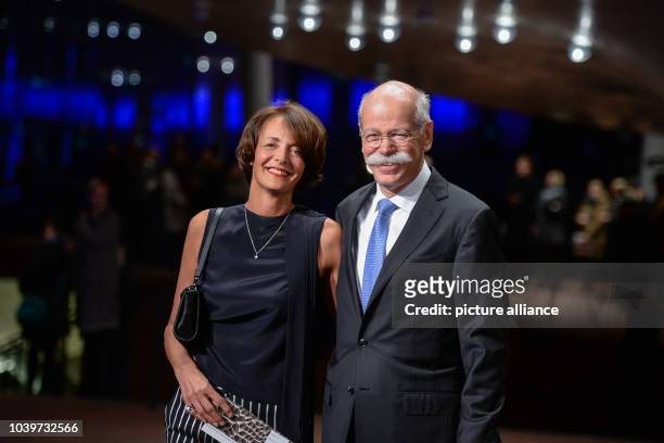 Dieter Zetsche, chairman of the Daimler AG and his wife Anne arrive for the inauguration of the Elbphilharmonie in Hamburg, Germany, 11 January 2017....