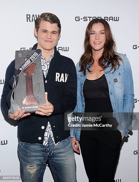 Chess player Magnus Carlsen and actress Liv Tyler attend the G-Star RAW World Chess Challenge at The Cooper Square Hotel on September 10, 2010 in New...
