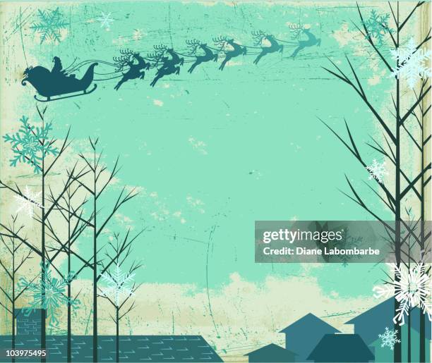 snowy night with santa's sleigh and reindeer flying over rooftops - bare tree stock illustrations