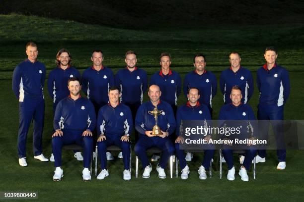 Captain Thomas Bjorn of Europe and his players pose during a photocall ahead of the 2018 Ryder Cup at Le Golf National on September 25, 2018 in...