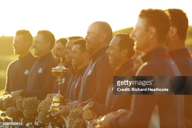 Captain Thomas Bjorn of Europe and his players pose during a photocall ahead of the 2018 Ryder Cup at Le Golf National on September 25, 2018 in...