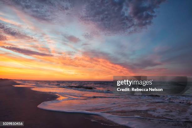 sunrise seascape at the gulf of mexico - mobile alabama stock pictures, royalty-free photos & images