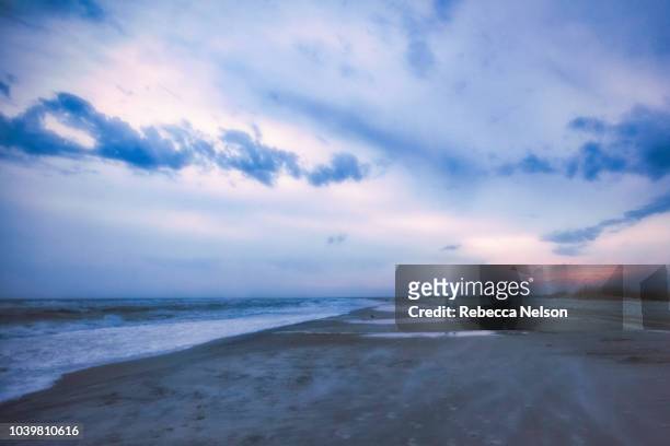 seascape during blue hour along the gulf of mexico - gulf of mexico stock pictures, royalty-free photos & images
