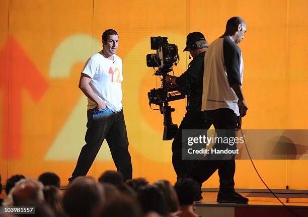 In this handout image provided by ABC, An extraordinary lineup of actors, musicians, athletes and journalists banded together for "Stand Up To...