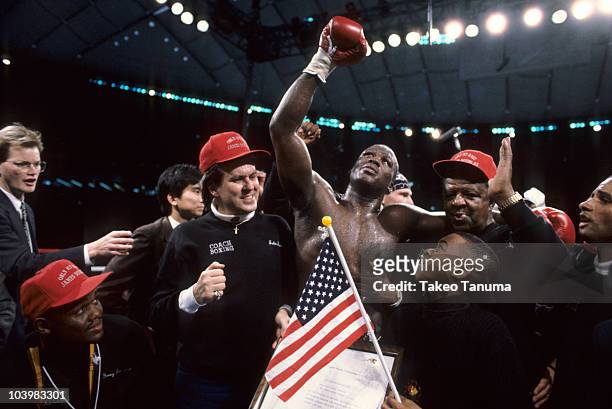 Heavyweight Title: James Buster Douglas victorious with son Lamar after winning fight vs Mike Tyson at Tokyo Dome. Tokyo, Japan 2/11/1990 CREDIT:...