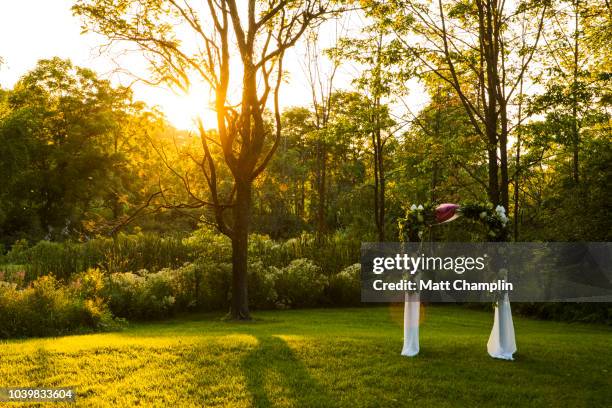 outdoor wedding altar at sunset - empty wedding ceremony stock pictures, royalty-free photos & images