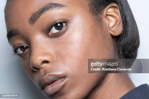Model, make up detail, is seen backstage ahead of the Gabriele Colangelo show during Milan Fashion Week Spring/Summer 2019 on September 22, 2018 in...
