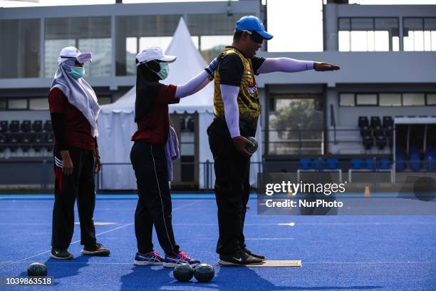 Indonesian player takes part in a lawn bowls practice session, ahead of the 2018 Asian Para Games in Jakarta, Indonesia on Tuesday, September 25,...