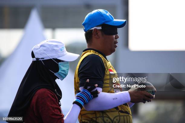 Indonesian player takes part in a lawn bowls practice session, ahead of the 2018 Asian Para Games in Jakarta, Indonesia on Tuesday, September 25,...