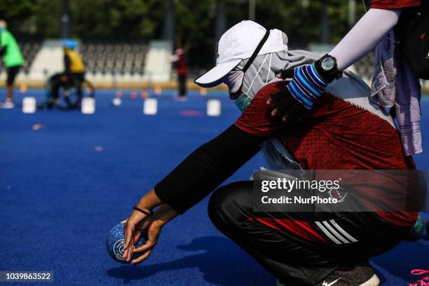 Indonesian player takes part in a lawn bowls practice session, ahead of the 2018 Asian Para Games in Jakarta, Indonesia on Tuesday, September 25,...