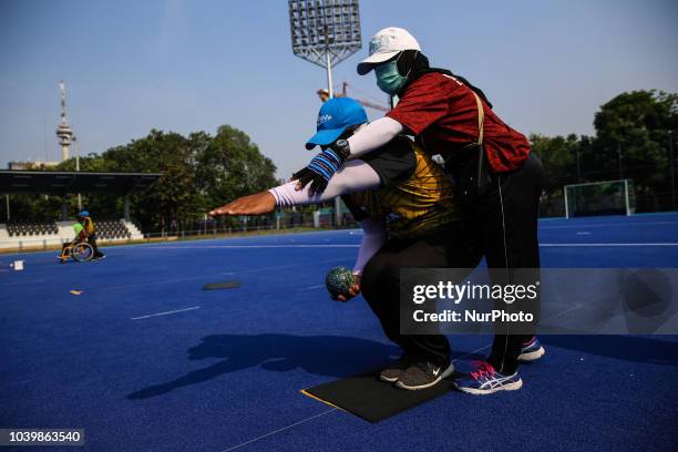 Indonesian player takes part in a lawn bowls practice session, ahead of the 2018 Asian Para Games in Jakarta, Indonesia on Tuesday, September 25,...