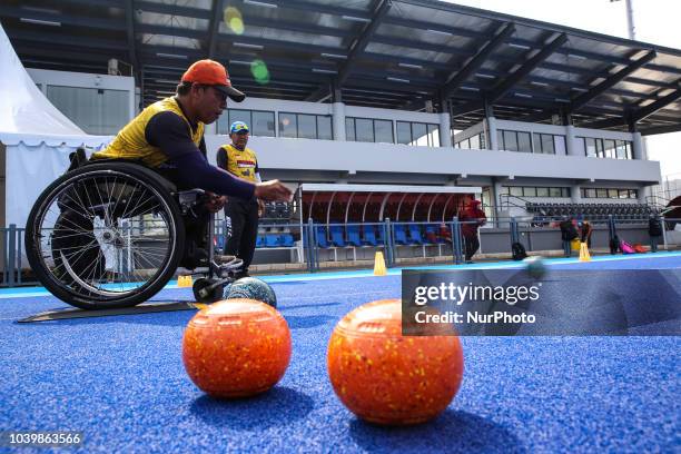 Indonesian player takes part in a lawn bowls practice session, ahead of the 2018 Asian Para Games in Jakarta, Indonesia on Tuesday, September 25,...