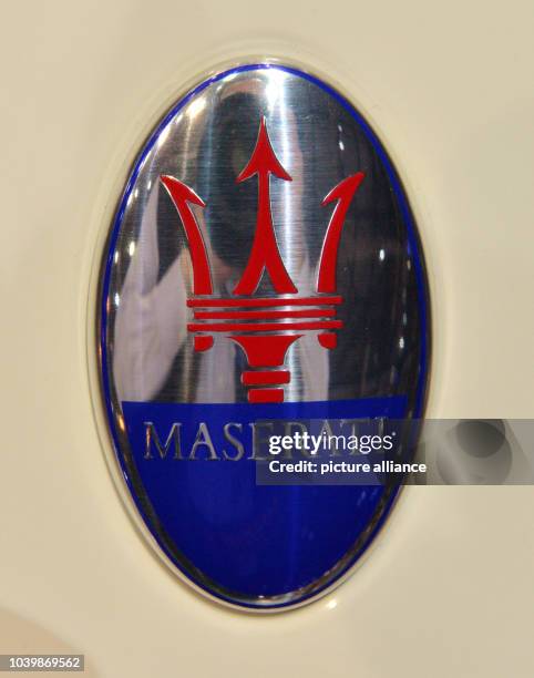 The logo of car manufcaturer Maserati is on display during the International Geneva Motor Show 2014 in Geneva, Switzerland, 5 March 2014. The...