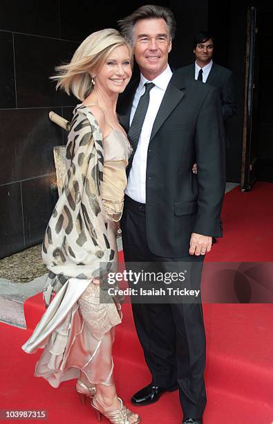 Actress Olivia Newton-John and Husband John Easterling arrive at Spice Route on September 9, 2010 in Toronto, Canada.