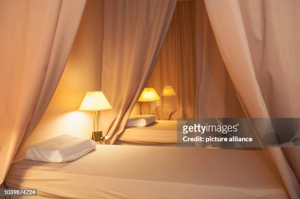 The lunchhour sleeping studio 'Nickerchen' is pictured in Berlin, Germany, 17 December 2014. The beds are separated with curtains. 20 minutes...