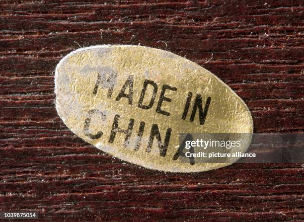 The 'Made in China' label on a product in Sieversdorf , Germany, 17 February 2016. Photo: Patrick Pleul | usage worldwide