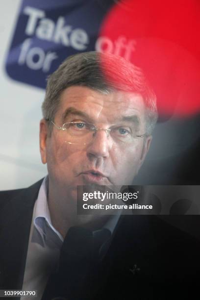 The new president of the International Olympic Committee , Thomas Bach, speaks at the airport in Frankfurt Main upon arrrival, Germany, 12 September...