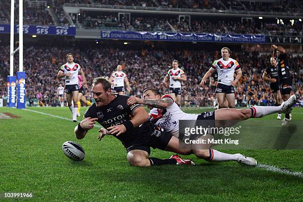 Gareth Ellis of the Tigers drops the ball over the line during the NRL Second Qualifying Final match between the Wests Tigers and the Sydney Roosters...