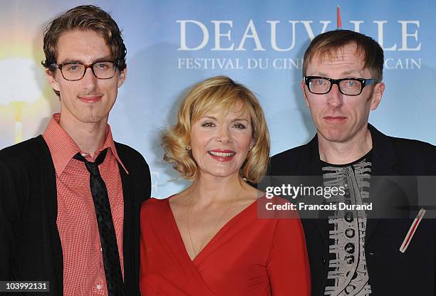 Actors Dustin Ingram, Kim Cattrall and director Keith Bearden attend the photocall for the film 'Meet Monica Velour' during the 36th Deauville...