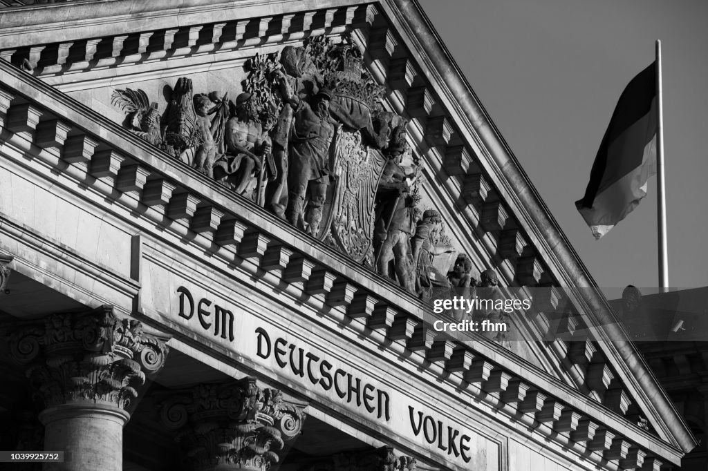 The famous inscription on the architrave on the west portal of the Reichstag building in Berlin: "Dem Deutschen Volke" (Germany)
