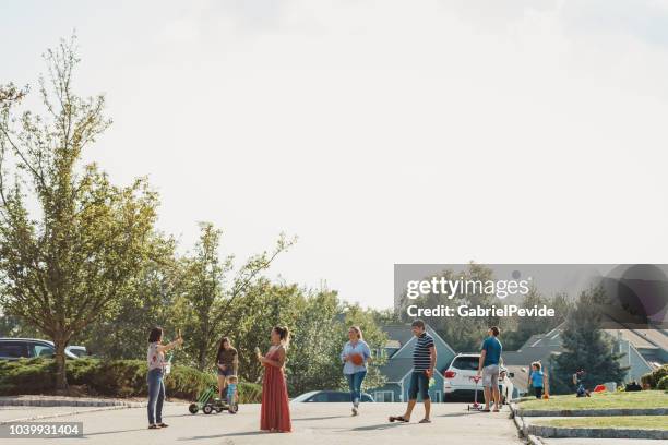 neighbors talking and kids playing - neighbor stock pictures, royalty-free photos & images