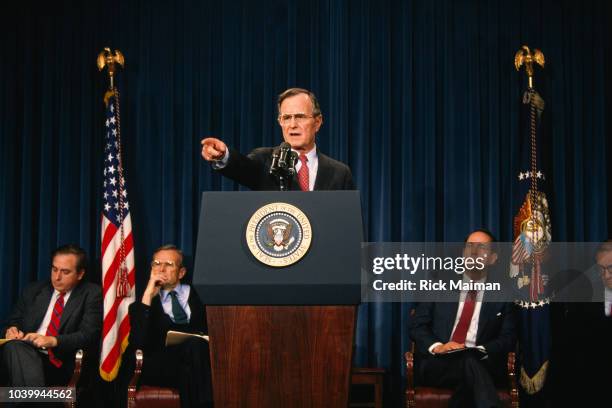 President George Bush gives a press conference announcing a plan to rescue the Nation's savings and loan industry and bolster the banking industry...