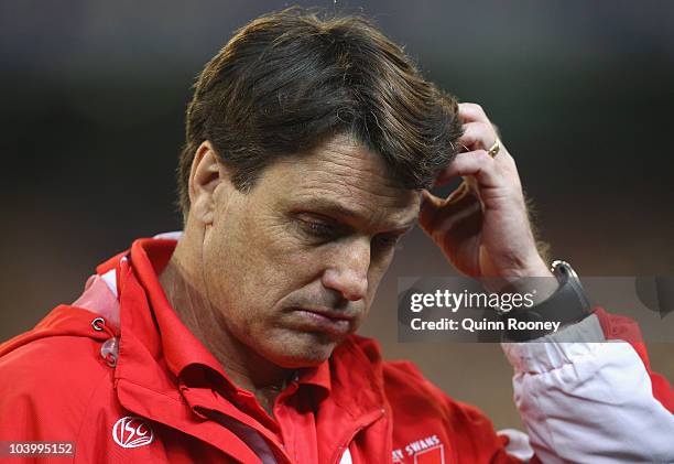 Paul Roos the coach of the Swans scratches his head during the AFL First Semi Final match between the Western Bulldogs and the Sydney Swans at...