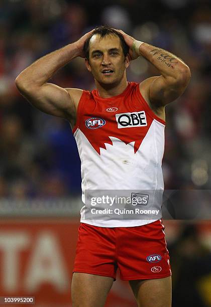 Daniel Bradshaw of the Swans looks dejected after missing a shot on goal during the AFL First Semi Final match between the Western Bulldogs and the...
